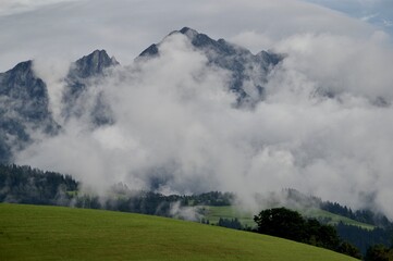 Clouds surrounding mountains in The Tirol, Austria close to Soll. 