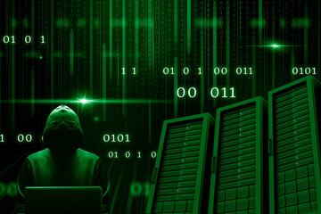 Silhouette du cybercriminel devant son écran d'ordinateur portable s'attaquant à des serveurs informatiques sur fond de données binaires vert