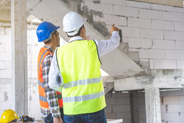 Builder team, two asian young engineer, architect male, man discussing, meeting contractor, follow...