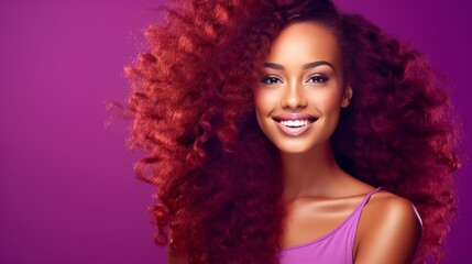 Beautiful, sexy, happy smiling dark-skinned African American woman with perfect skin and red hair, on a purple background, banner.