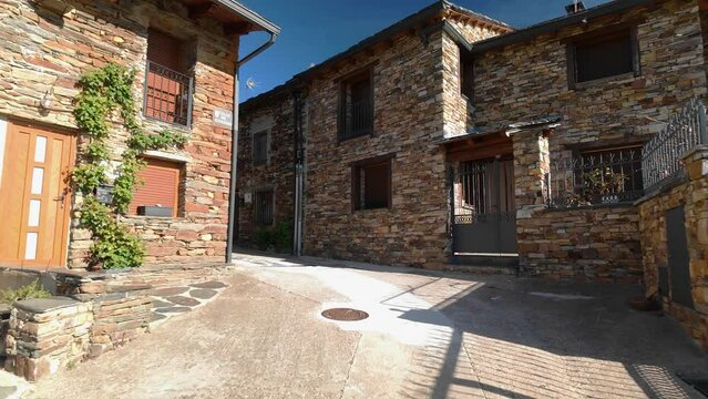 Picturesque streets with stone houses on the route of the black villages, Castilla la Mancha.