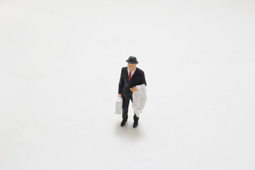 the figures man, businessman handbag, tiny figure