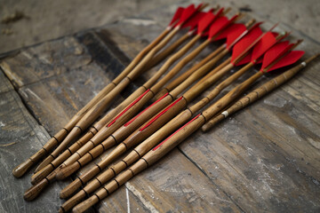 A quiver of blunt arrows, ideal for non-lethal archery games and activities.