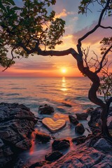 Beautiful sunset over the sea, rocks with heart-shaped sand.