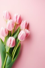 Naklejka premium b'A bouquet of pink tulips on a pink background'