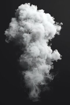 b'White smoke cloud rising up on black background'
