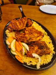 grilled chicken with rice Arabic food kuzhi mandhi 