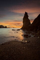 Sunset between the rocks at low tide on the shore of Playa del Silencio, Asturias II