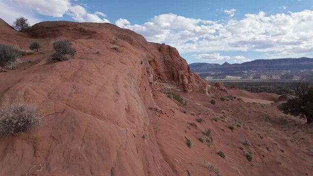 Moving through the rough terrain in the Escalante desert overlooking the landscape in Utah.