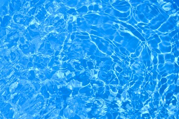 blue water texture ripples. tropical summer background. sea water surface. blue water background