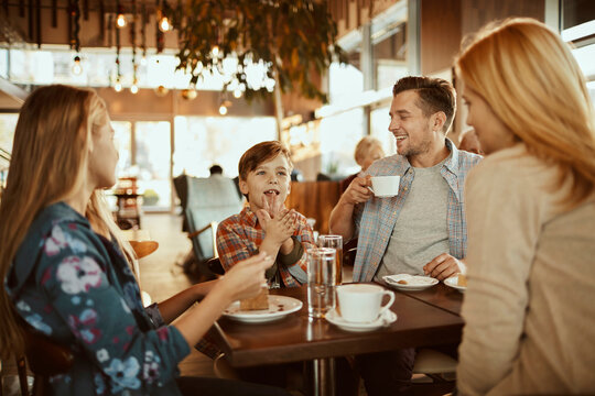 Family enjoying time together at a cafe