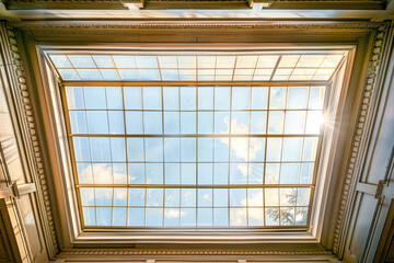 Glass ceiling with window. Square shot, vintage.