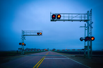 Railroad Crossing Stop Barricade on the rural road in American Heartland, South Dakota