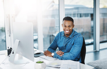 Creative, black businessman and portrait in office with computer for interior designing with...