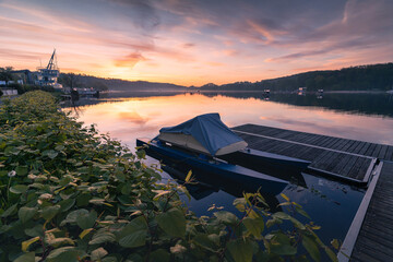 Landscape of Lake Baldeneysee on the Ruhr River before sunrise. Dawn over the lake in the city of...