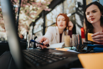 Focused business entrepreneurs discussing strategy while having a meeting at an outdoor cafe.