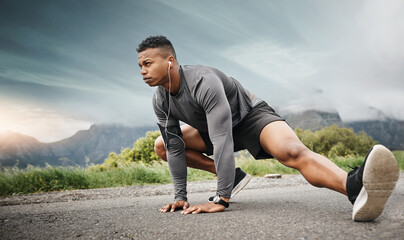 Man, stretching legs and music before training, fitness and workout on road outdoor. Male athlete,...