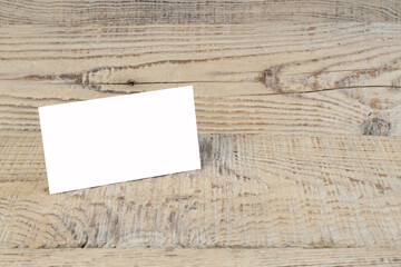 Blank business cards on the wooden table. Template for ID. Top view. - 798134064