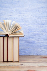 open book, books on the blue background. Back to school. Education. Copy space for text. - 798134263