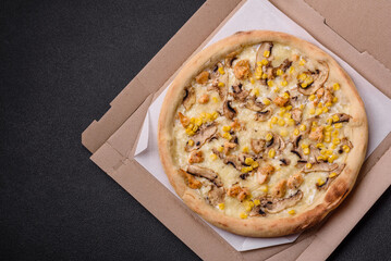 Delicious pizza with corn, cheese, tomatoes and mushrooms, salt, spices and herbs