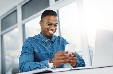 Smile, smartphone and black man by computer in office, workspace and desk happy in creative career....