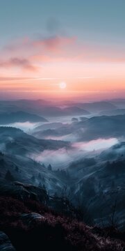 b'Misty mountain landscape with vibrant sunset sky'