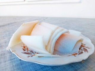 Chopped pork lard slices are in a plate