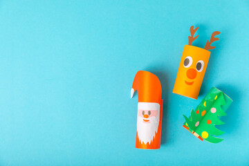 Toilet paper crafts on a colored background. Kids crafts made with toilet paper roll. DIY....