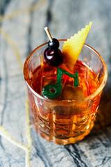 Alcoholic drink. A cocktail with elite alcohol on dark black background