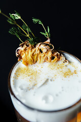 Alcoholic drink. A cocktail with elite alcohol on dark black background