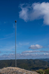 Lightning conductor at the top of a mountain building - obrazy, fototapety, plakaty