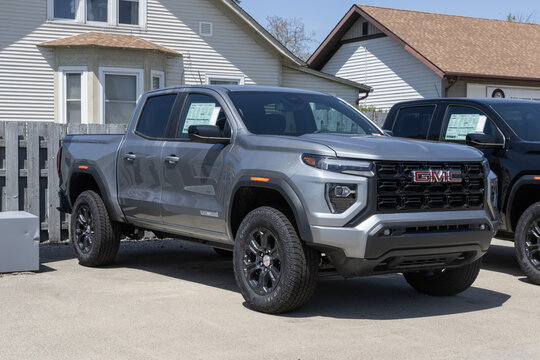 GMC Canyon 2WD Elevation Crew Cab pickup display. GMC offers the Canyon in Elevation, AT4, Denali, and AT4X models. MY:2024