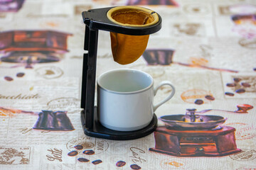 Preparing coffee with an original cloth strainer