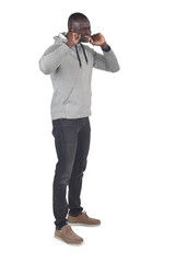 Obraz premium side view of a man covering her ears from noise on white background