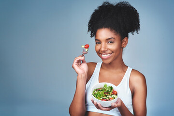 Space, portrait or black woman with salad in studio for healthy meal, nutrition diet or digestion...