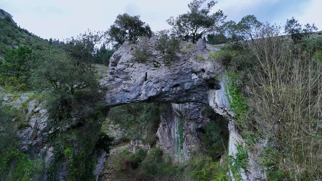 Landscape around the natural stone Arch of Jentilzubi in Dima in the Province of Bizkaia. Basque Country. Spain. Europe