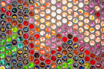 Marbles designed artistic way to create a pattern
