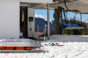 medical sled on a downhill slope for tramping downhill skiers and snowboarders. Active and safe...