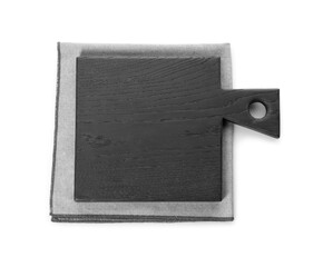 Black wooden cutting board and napkin isolated on white, top view