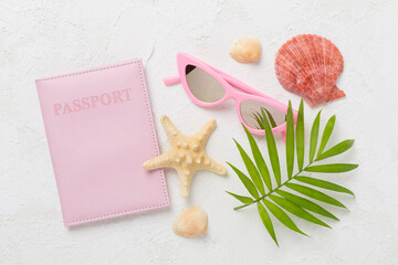 Bright flat lay with travel accessories on concrete background, top view
