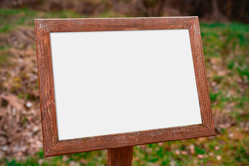 Wooden frame that can contain logos and photos, white space, blurred background