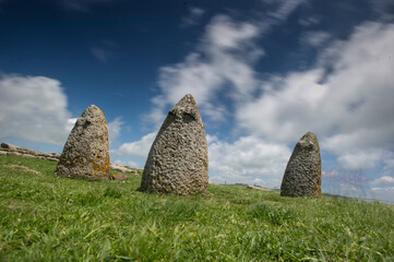 Menhir stones from the bronze age at Archeological site of Tamuli, Sardinia island, Italy, betili...
