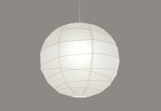 Traditional white round paper lantern isolated on gray background