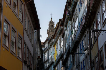 Typical colorful houses and the Clerigos Tower in Porto city, Portugal