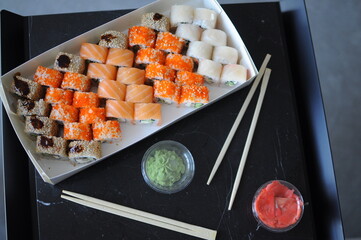 japanese sushi food. Maki ands rolls with tuna, salmon, shrimp, crab and avocado.