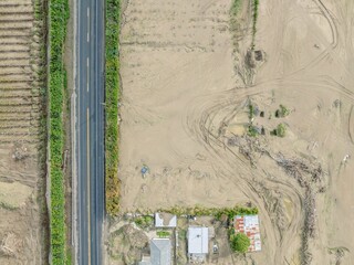 Silt buildup and clearing of it from the Cyclone Gabrielle natural disaster. Pohokura-Bay View, Napier, Hawke's Bay, New Zealand. February 2023