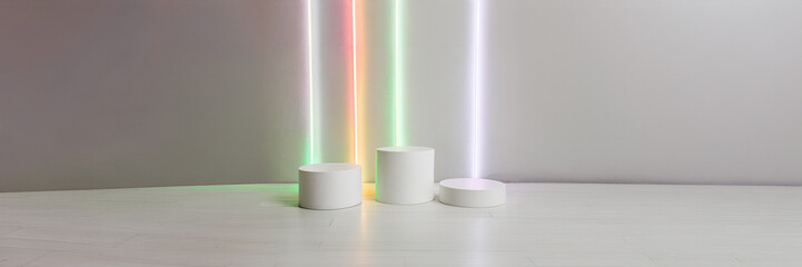 podium set white design with neon color vertical lights