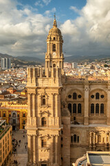 Malaga cityscape with beautiful Cathedral at sunset, Spain