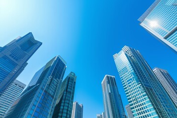 Obraz premium Clear Blue Skyline: Modern Cityscape with Glossy Skyscrapers