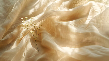 Beige linen fabric texture with folds and a natural floral sunlight shadow, aesthetic summer wedding bohemian background